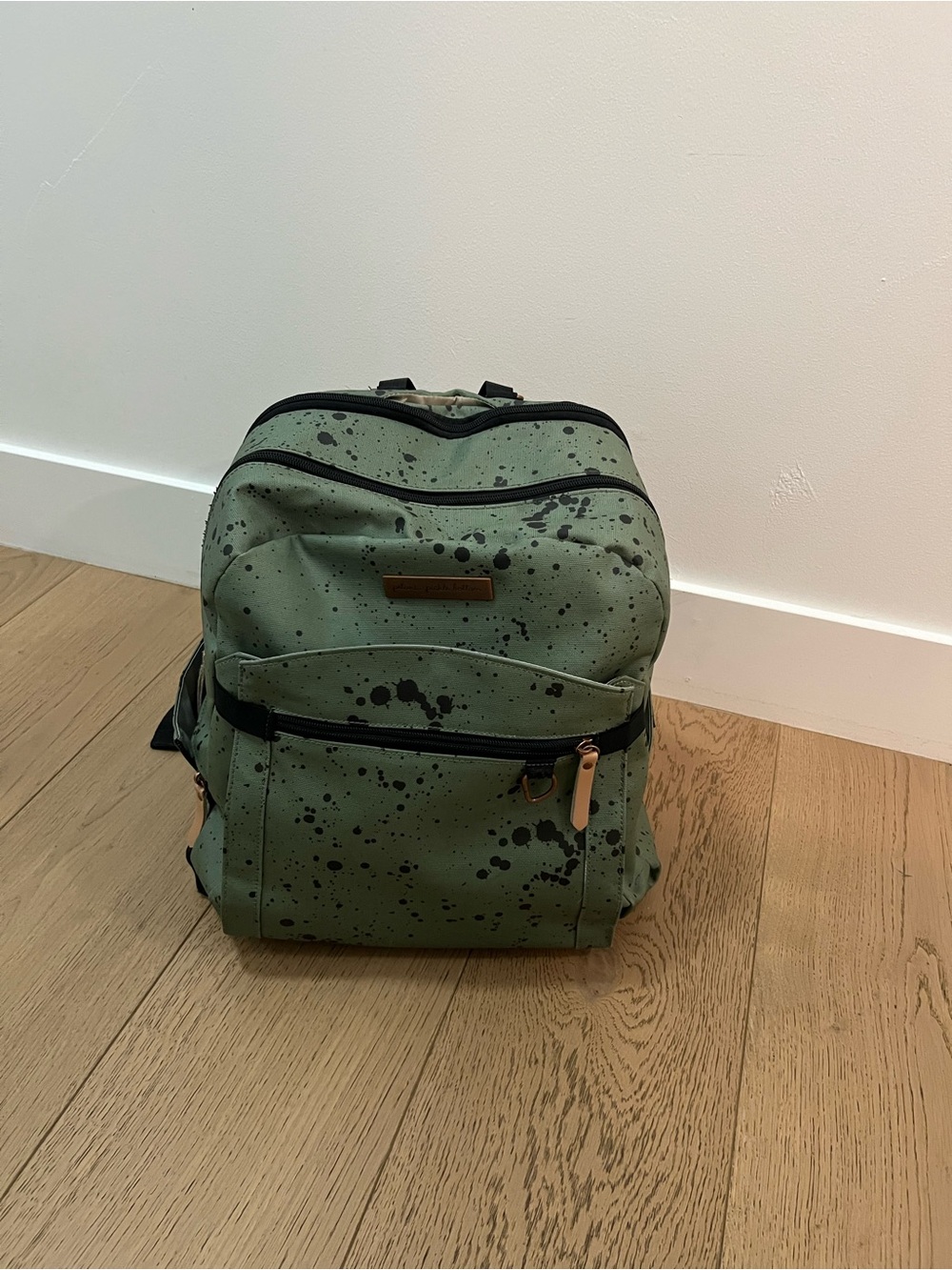 Petunia Pickle Bottom Green Diaper Bag with Black Splatter